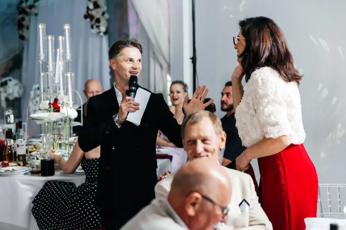 Guests laughing at the table