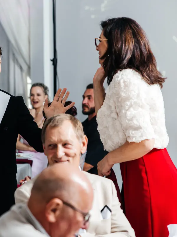 Guests laughing at the table