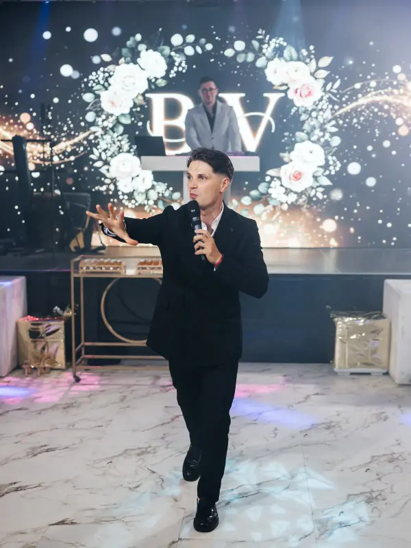 Vladyslav hosting a wedding reception on the dance floor